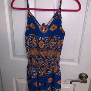 Blue and orange patterned romper